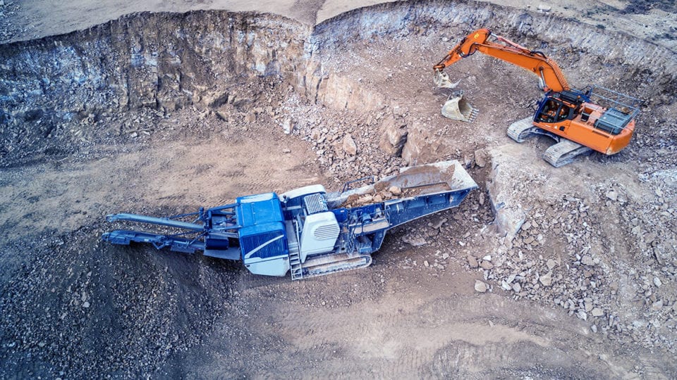 A stone crusher in a mining hole